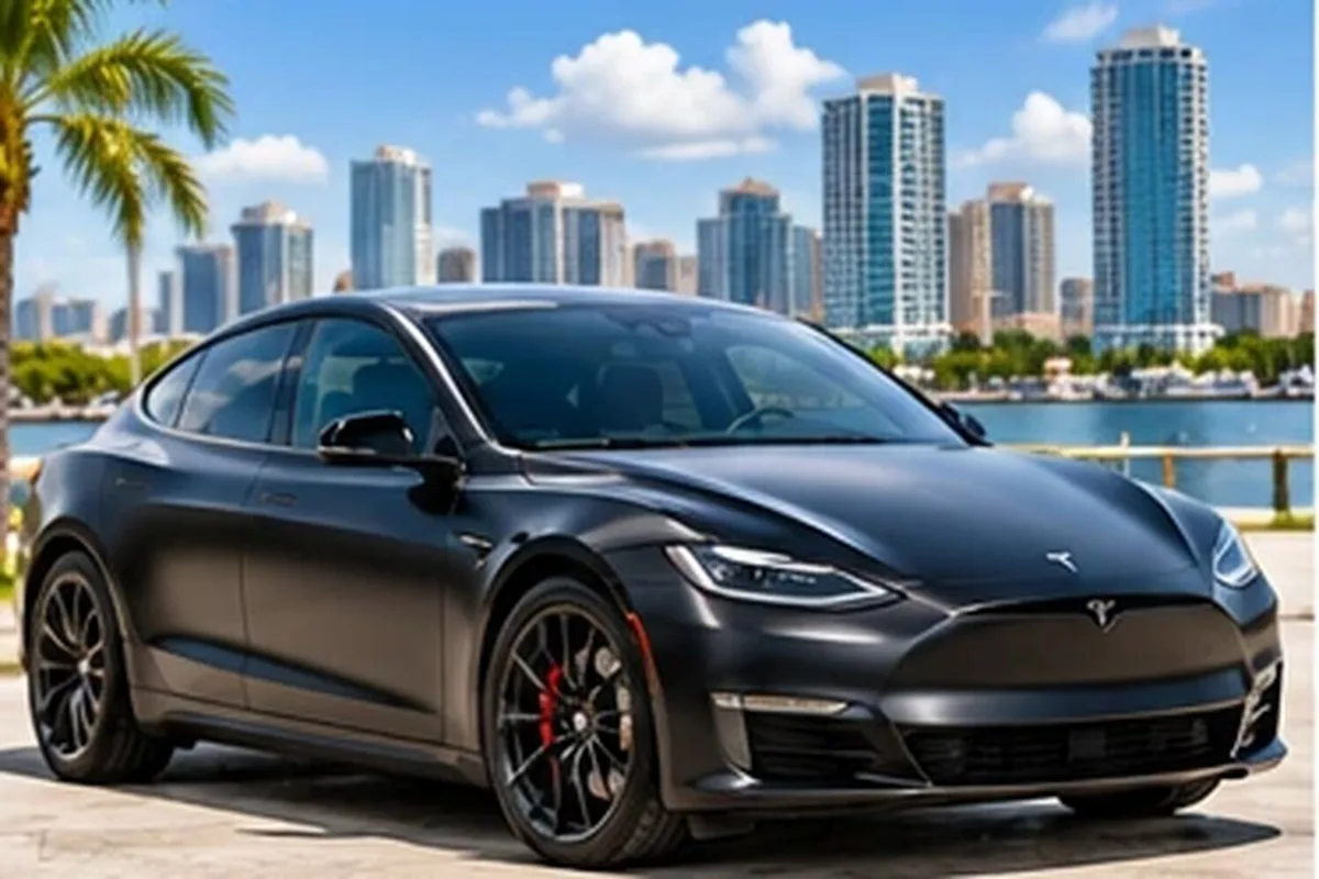 Matte gray wrapped Tesla sedan by the Las Vegas waterfront